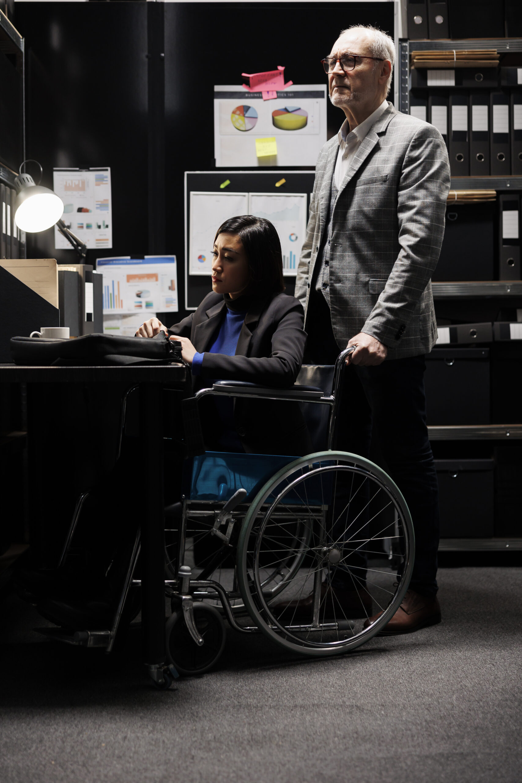 bookkeeping paralyzed businesswoman wheelchair coworker working administrative file room office surrounded by flowcharts consultancy bureaucratic workplace filled with business folders scaled